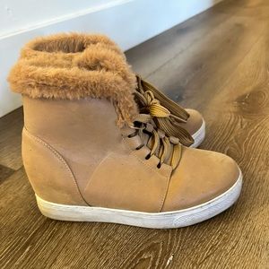 Boutique wedges. Worn a handful of times.